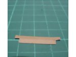 Measuring and cutting the strip for the dolls dollhouse luggage/trunk