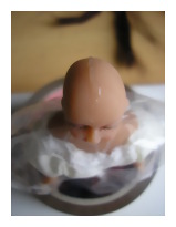 Applying glue line on dolls head