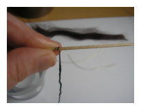 Twisting wefts over cocktail stick